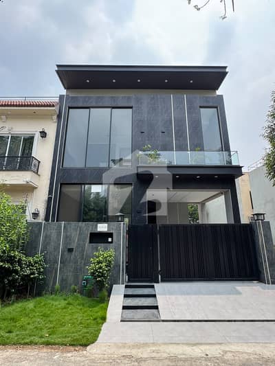 A beautifully designed and impeccably maintained 5 Marla luxury house is available in a prime DHA location, offering the perfect blend of elegance, comfort, and modern living.