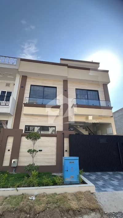 Mpchs multi gardens b-17 Islamabad  5 Marla brand new double unit house available for rent  4 bed rooms 5 wash rooms  drowning rooms  tv louch  2 vip kitchens  sarvant room  car parking  24/7 BORING WATER ELECTRIC METER AVAILABLE NEAR MARKET masjid school park everything available on walking distance  prime location