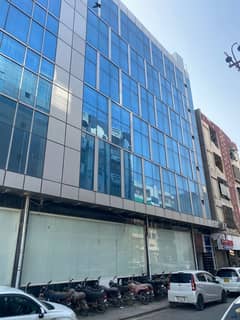 Brand New Rented Office Available For Sale 3rd Floor With Lift with Balcony , Common Washroom , located Big Bukhari Main Road Corner Building