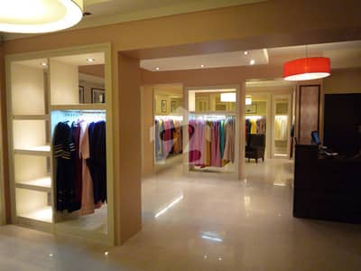 At Investor Rate Commercial Shop For Sale Facing   Defence Raya  , Lahore