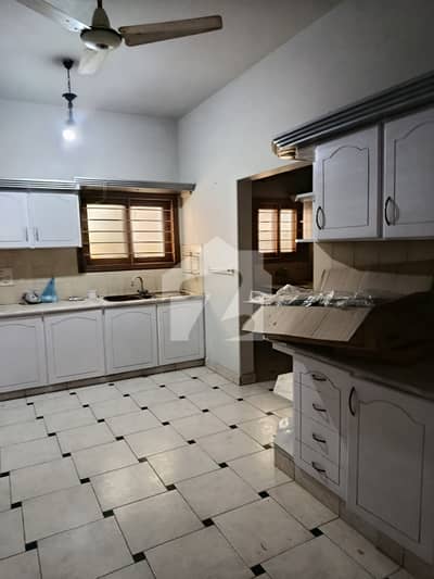 A Stunning Prime Location House Is Up For Grabs In DHA Phase 4 Karachi