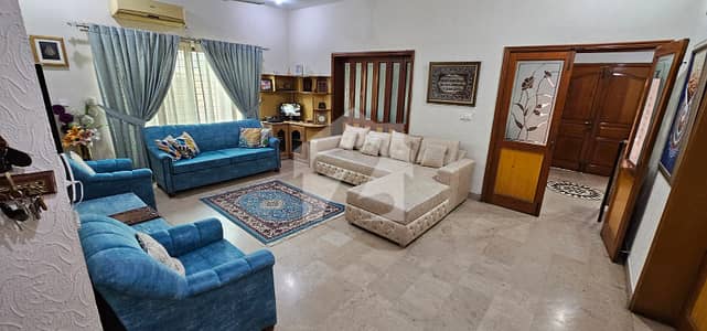 One Kanal Used Modern Design Well Maintained House For Sale At Prime Location Of DHA Lahore Near To Park Masjid & Commercial Market.