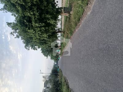 1kanal prime location plot For sale, back of main  Surrounding beautiful house