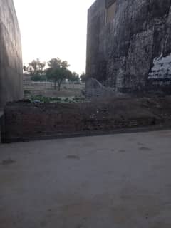 Facing Park 5 marla Possession Next To corner Road Level Plot available for sale in low price