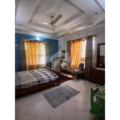 Prime Location 1 Kanal Triple -Story House For Sale - Main Boulevard Bahria Town
