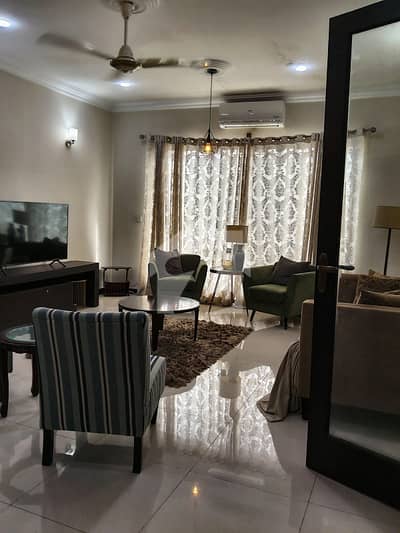 Premium corner house, west open, in Capital Society, Scheme 33. 422 sq. yds. , ground + 1: 2 Bed DD on ground floor, 3 Bed DD upstairs. Super luxurious, premium construction, safe gated community, ample car parking, and complete documentation. Dont miss this exquisite opportunity!