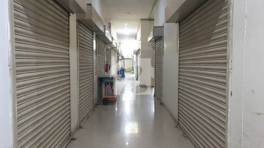 SMALL COMMERCIAL SHOP FOR SALE Grey Noor Tower & Shopping Mall