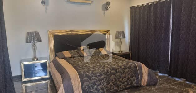 Fully Furnished 5 Beds 1 Kanal Beautiful Location House for Sale in DHA Phase 6 Lahore.