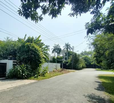 50-Marla Premium Plot for Sale Sarfaraz Rafique Road, Lahore Cantt | Front Facing Lush Green Belt .