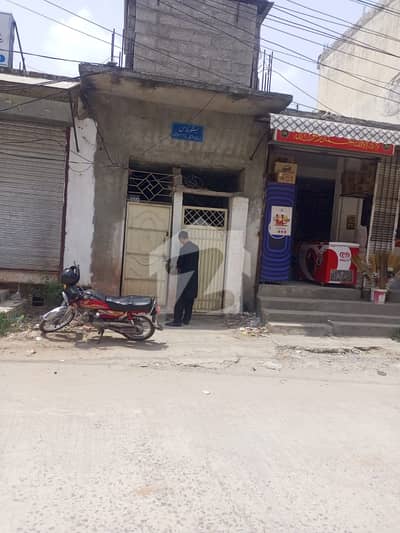 9 Marla Corner Commercial Building 10 Rooms Attach Wash Room, Kitchen And 4 Shops Urgent For Sale