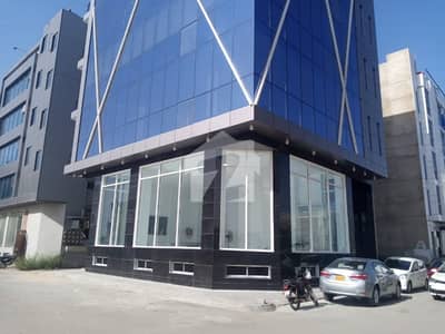 Location: Ground Basement For Rent 3 Side Corner 2 Side enterance Main Khayaban-e-Shaheen Facing Murtaza Commercial For Rent Area: 200 square yards Floors: Basement + Ground + 4 Typical Floors Basement + Ground Floor:  GF Height 16ft Provision of Mezanine floor Suitable for retail or office use with high foot traffic Typical Floors: 4 floors  Designed for flexible office or commercial space Key Features: 		Located in a prime