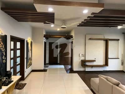 WELL-MAINTAINED 500 SQUARE YARD 6-BEDROOM BUNGALOW WITH BASEMENT FOR RENT IN DHA PHASE 6, KARACHI