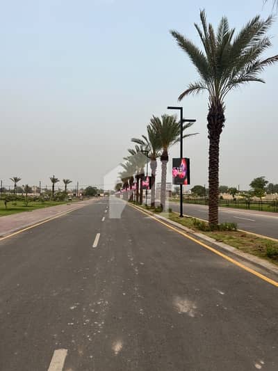 2.2 marla shop (plot) available in city walk prime location 75% pyment clear 25% on time 6 months