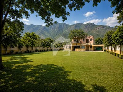 Front Back Open Margalla Road House With Extra Land Is For SALE