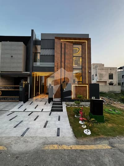 An Exquisite 05 Marla Luxury Mansion For Sale , Ideally Located On A Wide Approach Road In The Prestigious DHA 9 Town.