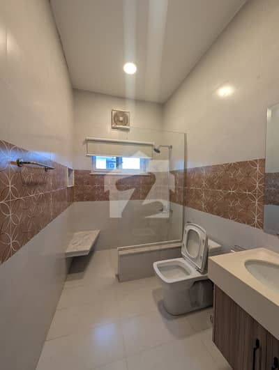 F-10 (Villa) 1 Kanal Excellent Double Storey House Modern Fittings Along With Tile And Wooden Flooring Proper 5 bedrooms, 5 Attached New Bathrooms Drawing Dining, TV Lounge, Kitchen, ACs Installed