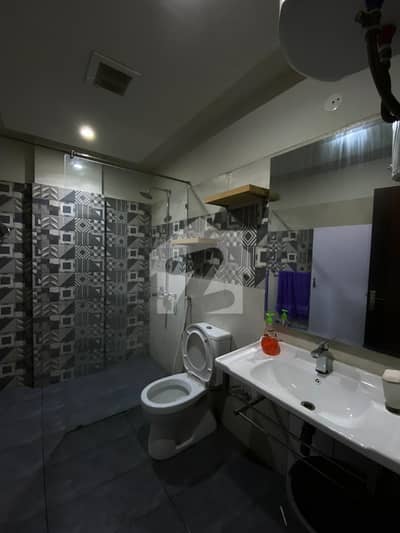 Bahria town phase 7 Rawalpindi acntilado commercial two bedrooms apartment fully luxury furnished lift 24/7 wifi security tv ac for rent available long time monthly daliy basis