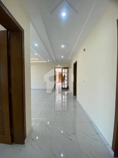 A spacious and well-maintained 1 Kanal Upper Portion is available for rent in the prime location of DHA Phase 2, Sector h Islamabad.   Property Features:  - 3 Spacious Bedrooms - 4 Attached Washrooms - TV Lounge - Modern Kitchen - Drawing & Dining Room - 1 Car Parking - Servant Room - Store Room  Utilities:  - Gas Available - Electricity Available - High-Speed Internet Available