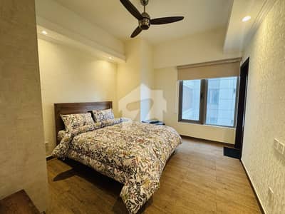 SUKHCHAYN F-10 | Executive Pool-Facing Two Bedroom Fully Furnished Apartment | High Floor | Premium Lifestyle Living