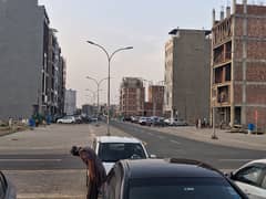 5.33 marla commercial 102 c for sale hot location rigestri ready.