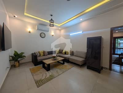 A Beautiful House For Rent In F10 Ideal Location All Tile Flooring Near To Market Close To Double Road Big Parking Front Beautiful Lawn