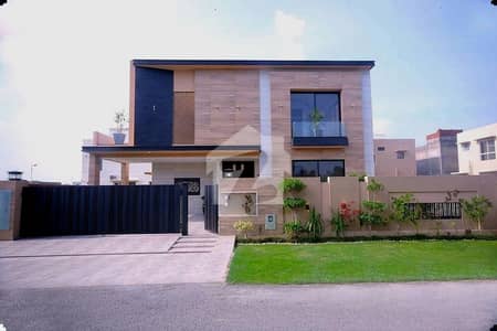 1 KANAL ELEGANT & SUPER HOT LOCATED BUNGALOW WITH BASEMENT IS AVAILABLE IN THE BEST BLOCK OF DHA LAHORE.