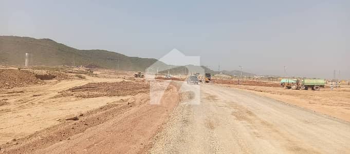 Prime Location 1kanal plot Available For sale in Margalla Orchard park road Housing Scheme islamabad Block E