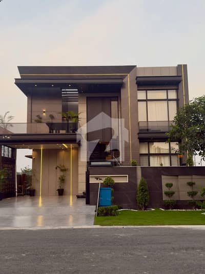 SYED BROTHERS PROUDLY OFFERS: 1-Kanal Elegant And Fully Furnihsed Modern Bungalow with SQs in Basement Is Available In The Best Block Of DHA Lahore.