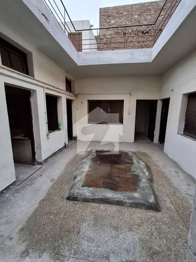 Corner Commercial Building, 4-Shops And 2 House Units With Separate Entrance 5.5 Marla