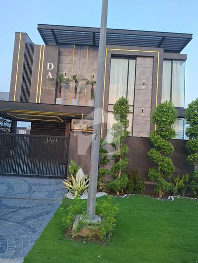 SYED BROTHERS PROUDLY OFFERS: 1-Kanal Elegant And Fully Maintained Modern Bungalow Is Available In The Best Block Of DHA Lahore.