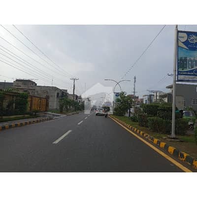Main Double Road 5 Marla Residential Plot In Al-Ahmad Garden Housing Scheme For Sale At Good Location