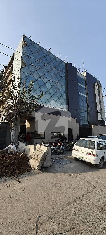 1 KANAL BASEMENT PARKING PLUS 3 FLOORS BRAND NEW BUILDING FOR RENT