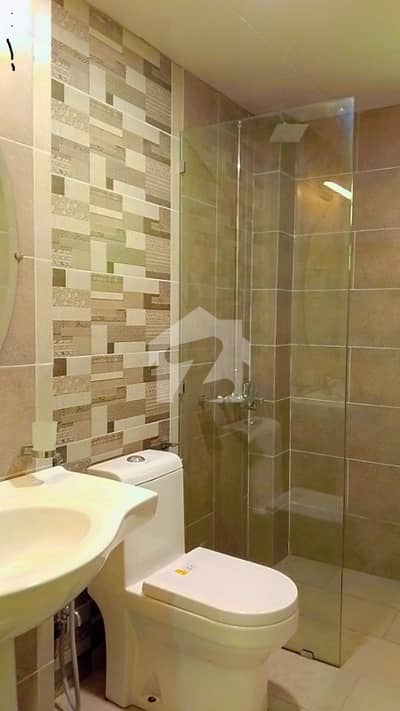 11 MARLA 3 BEDROOM NEW APARTMENT AVAILABLE FOR RENT 11 MARLA 3 BEDROOM NEW APARTMENT AVAILABLE FOR RENT
