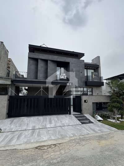 1 Kanal Ultra Modern Designer House for Sale in DHA Phase 6 Prime Location Near Defense Raya & Dolmen Mall