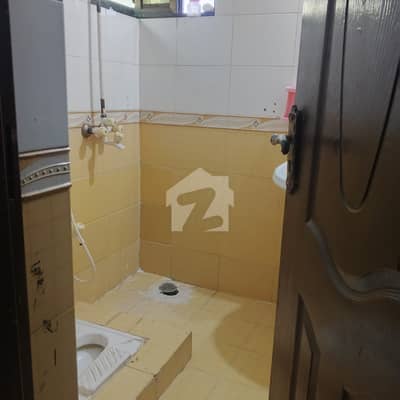 Johar town block R1 near Punjab college and park market