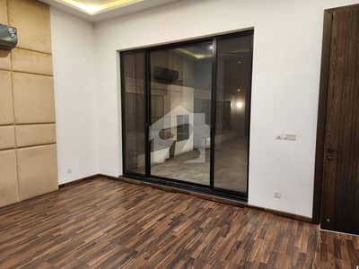 SYED BROTHERS PROUDLY OFFERS: 1-Kanal Elegant And Fully Maintained Modern Bungalow with 2 Servant Quarters Is Available In The Best Block Of DHA Lahore.