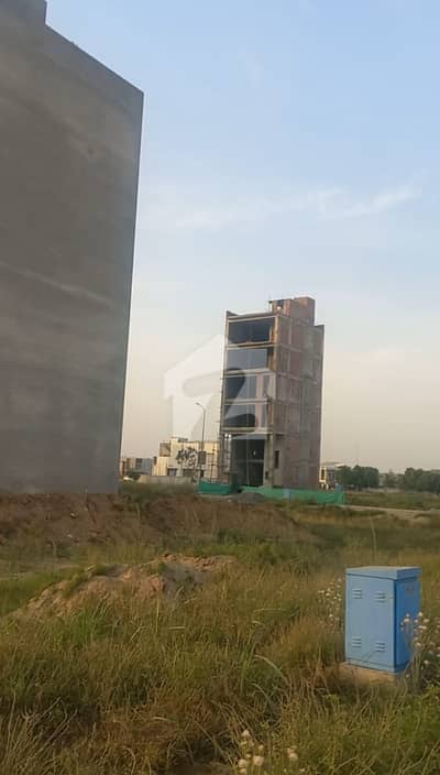 FACING PARKING PLOT # A-33 COMMERCIAL PLOT LOCATED IN THE BEST BLOCK OF DHA LAHORE.