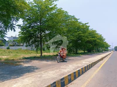 On 70 Wide Road 20 Marla Plot Surrounding Houses Close to DHA Raya Golf Course On 70 Wide Road 20 Marla Plot Surrounding Houses Close to DHA Raya Golf Course