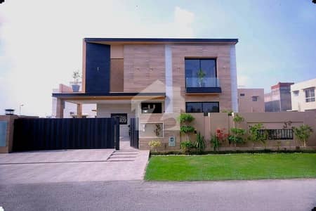 1 KANAL ELEGANT & SUPER HOT LOCATED BUNGALOW WITH BASEMENT IS AVAILABLE IN THE BEST BLOCK OF DHA LAHORE.