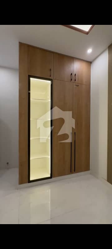100 YARDS MOST LUXURIOUS AND ARCHITECTURE ULTRA MODERN STYLE DOUBLE STORY BRANDNEW BUNGALOW FOR SELL IN DHA PHASE 7 EXT WITH FULL BASEMENT