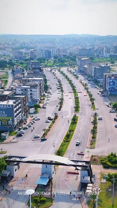سٹی ہاؤسنگ سکیم جہلم میں 6 مرلہ کمرشل پلاٹ 1.4 کروڑ میں برائے فروخت۔