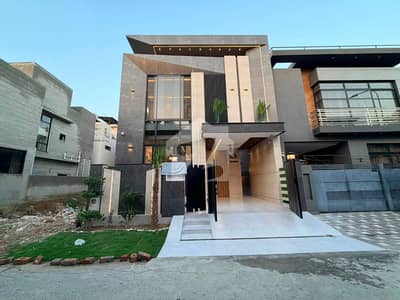 Own A Beautifully Designed 5 Marla Dream Home In DHA 9 Town Featuring A Private Swimming Pool, 3 Spacious Bedrooms & Exceptional Living Spaces