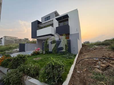 10 Marla ( 35*65 In Block C 1 ) Sun Face House Front Open + On 60 Ft Road. Top Location House. Masjid + Markaz + Park On Walking Distance. Double Unit House Available. For Sale In Multi Gardens MPCHS B-17 Islamabad.