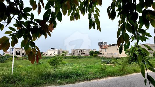 Highly Investment-Worthy 27 Marla Plot For Sale DHA Phase 8 Block U (Near Dolmen Mall & Airport)