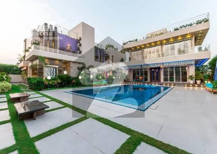 2 KANAL SLIGHTLY USED GALLERIA DESIGN FULLY FURNISHED VILLA WITH BEAUTIFUL OUTDOOR SWIMMING POOL PLUS CENIMA PLAYING AREA FOR SALE IN DHA PHASE 3 NEAR TO PARK.