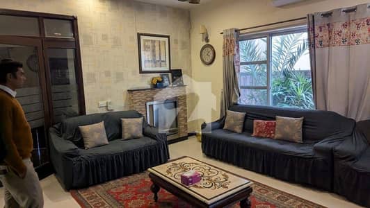 10 Marla House Slightly use Modern look 70ft road Hot location
