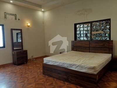 SPACIOUS 1,000 SQ YD OLD BUT WELL-MAINTAINED 7-BEDROOM BUNGALOW NEAR KHAYABAN-E-SHAMSHEER, DHA PHASE 5, KARACHI