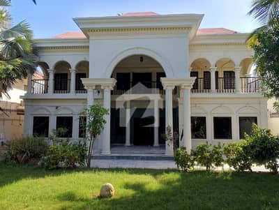 SPACIOUS 1,000 SQUARE YARD OLD BUT WELL-MAINTAINED 7-BEDROOM BUNGALOW NEAR KHAYABAN-E-SHAMSHEER, DHA PHASE 5, KARACHI