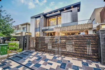 1 KANAL ELEGANT & SUPER HOT LOCATED SLIGHTLY USED BUNGALOW IS AVAILABLE IN THE BEST BLOCK OF DHA LAHORE.