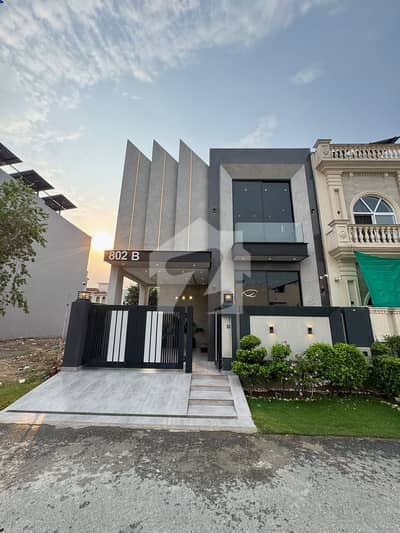A beautifully designed and impeccably maintained 5 Marla luxury house is available in a prime DHA location, offering the perfect blend of elegance, comfort, and modern living.